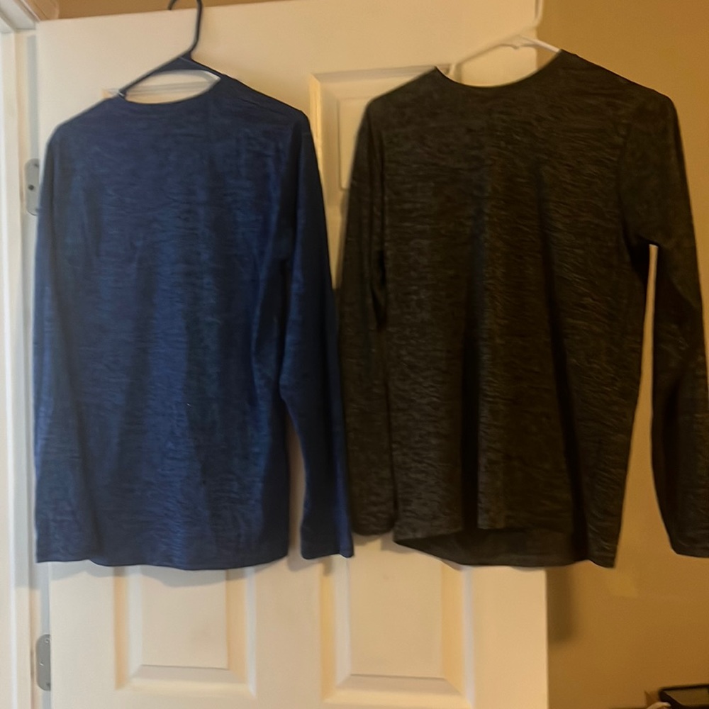 Two Reebok long sleeve Sri fit tees